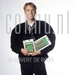 Richard Witsche (Date Unknown) at studio in Amsterdam.

[keywords]Posed, Half Length, Eyecontact, Smiling, Construction material[/keywords]